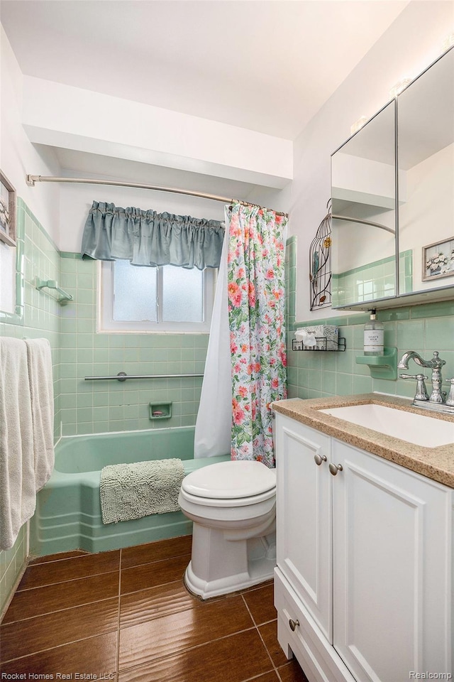 35221 Weideman St, Clinton Township, MI 48035 - full bathroom featuring tile walls, vanity, and shower / bath combination with curtain