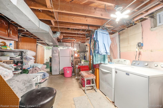 35221 Weideman St, Clinton Township, MI 48035 - unfinished below grade area with washer and dryer and freestanding refrigerator