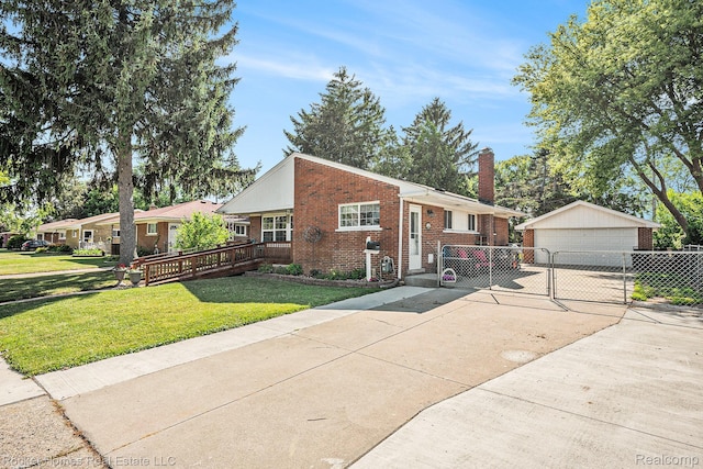 35221 Weideman St, Clinton Township, MI 48035 - view of front facade with brick siding, an outbuilding, a detached garage, a chimney, and a gate