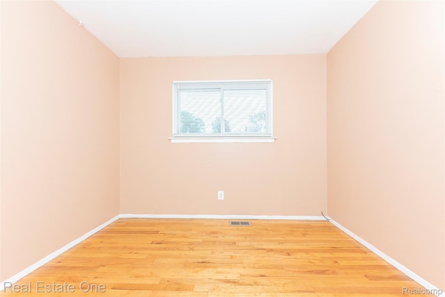 31121 Avondale St, Westland, MI 48186 - empty room featuring light wood-style floors and baseboards