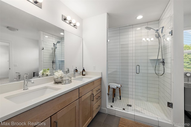 4260 Kent Rd, Royal Oak, MI 48073 - bathroom featuring a stall shower, double vanity, recessed lighting, and tile patterned flooring