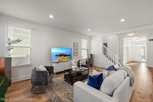 4260 Kent Rd, Royal Oak, MI 48073 - living room with stairs, light wood-style floors, and recessed lighting