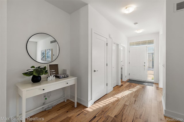 4260 Kent Rd, Royal Oak, MI 48073 - entryway with light wood-type flooring and baseboards