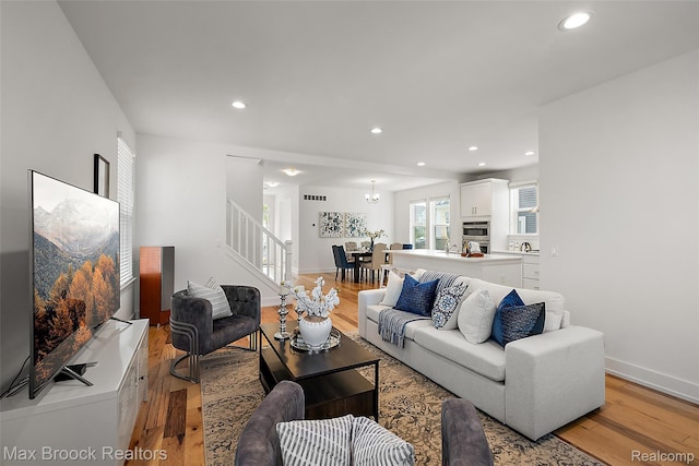 4260 Kent Rd, Royal Oak, MI 48073 - living area with light wood-style floors, recessed lighting, and stairway