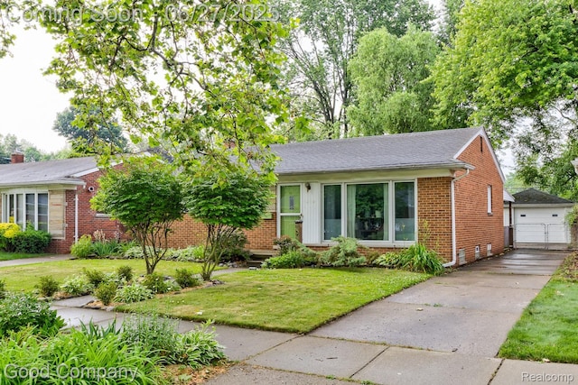24745 Ross Dr, Redford, MI 48239 - view of front of house featuring brick siding, a front yard, a garage, a shingled roof, and an outdoor structure