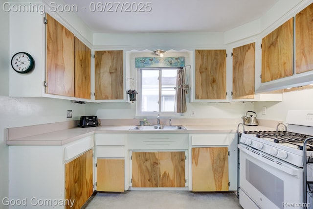 24745 Ross Dr, Redford, MI 48239 - kitchen featuring white range with gas stovetop and light countertops