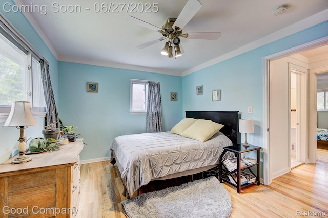 24745 Ross Dr, Redford, MI 48239 - bedroom with light wood-type flooring, ceiling fan, and ornamental molding