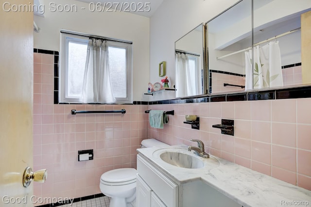 24745 Ross Dr, Redford, MI 48239 - bathroom featuring vanity, tile walls, a shower with shower curtain, and tile patterned floors