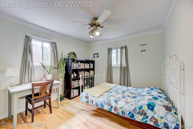 24745 Ross Dr, Redford, MI 48239 - bedroom with wood finished floors, crown molding, and a ceiling fan