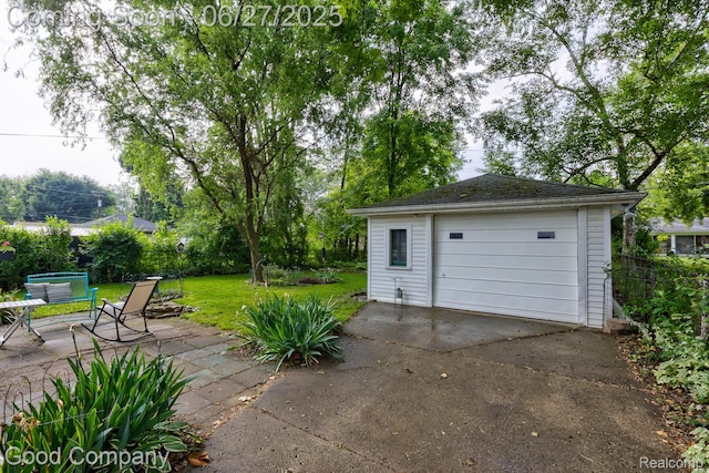 24745 Ross Dr, Redford, MI 48239 - detached garage featuring driveway