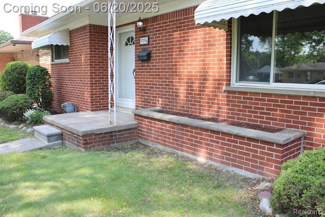 9396 Allen Rd, Allen Park, MI 48101 - doorway to property with brick siding