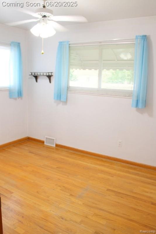 9396 Allen Rd, Allen Park, MI 48101 - empty room with a ceiling fan and light wood-style flooring