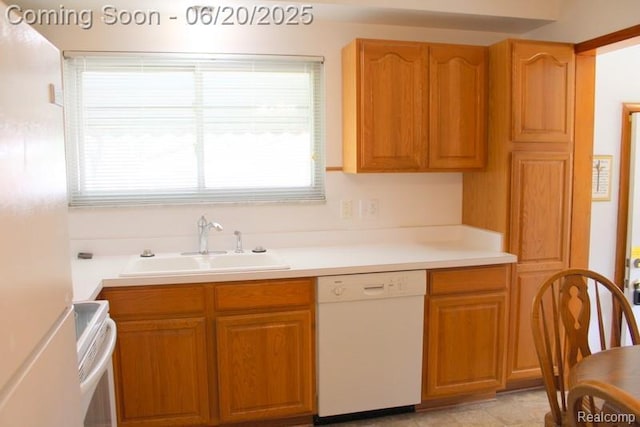9396 Allen Rd, Allen Park, MI 48101 - kitchen featuring white appliances, light countertops, and brown cabinetry