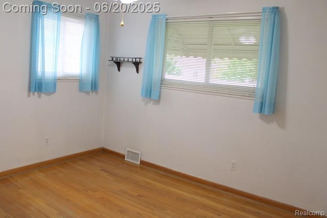 9396 Allen Rd, Allen Park, MI 48101 - spare room featuring light wood-style floors and baseboards