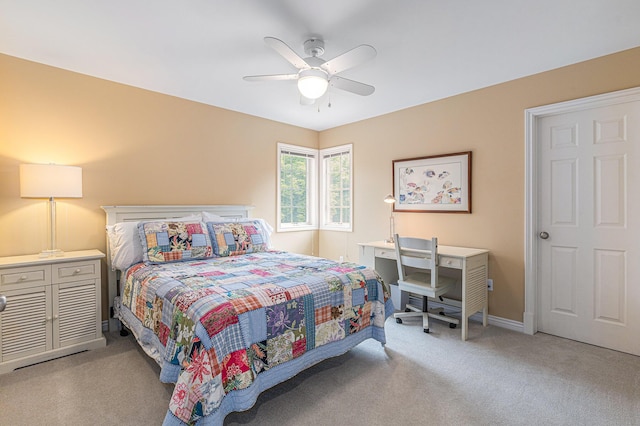 10310 E Rivershore Dr SE, Alto, MI 49302 - carpeted bedroom featuring a ceiling fan and baseboards