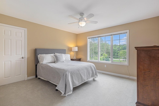10310 E Rivershore Dr SE, Alto, MI 49302 - bedroom with carpet and a ceiling fan