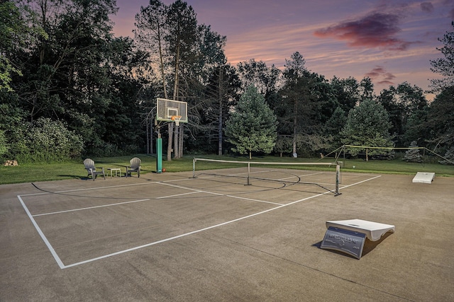 10310 E Rivershore Dr SE, Alto, MI 49302 - view of tennis court featuring view of wooded area