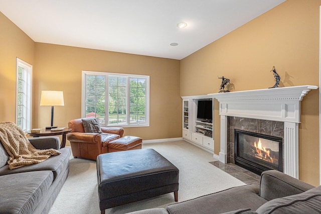 10310 E Rivershore Dr SE, Alto, MI 49302 - living area featuring light carpet and a fireplace
