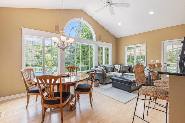 10310 E Rivershore Dr SE, Alto, MI 49302 - dining space with a chandelier, light wood-style floors, high vaulted ceiling, ceiling fan, and recessed lighting