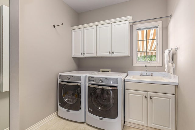 10310 E Rivershore Dr SE, Alto, MI 49302 - laundry area featuring cabinet space and washer and clothes dryer