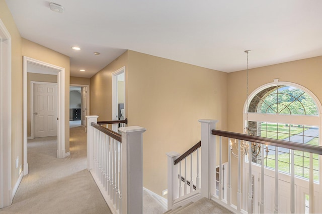 10310 E Rivershore Dr SE, Alto, MI 49302 - corridor featuring an upstairs landing, light carpet, and recessed lighting
