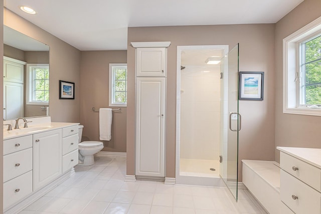 10310 E Rivershore Dr SE, Alto, MI 49302 - bathroom with a shower stall, vanity, and tile patterned flooring