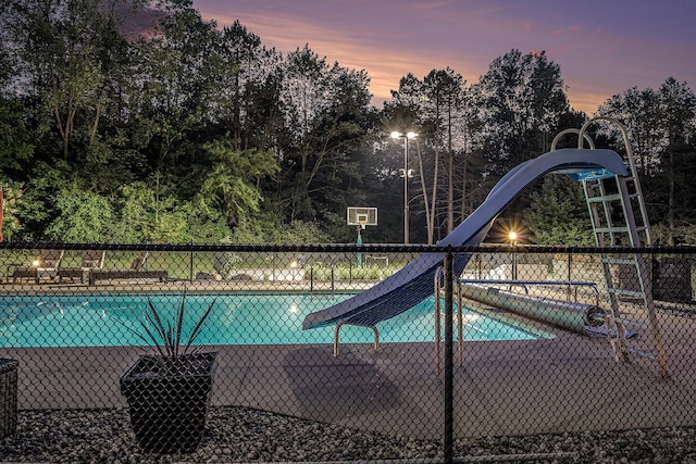 10310 E Rivershore Dr SE, Alto, MI 49302 - view of pool at dusk