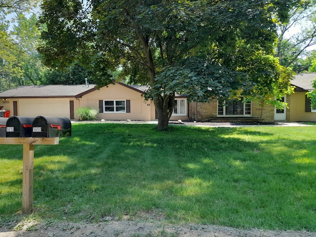 5615 Carlburt St, West Bloomfield, MI 48322 - single story home featuring an attached garage, a front yard, and stone siding