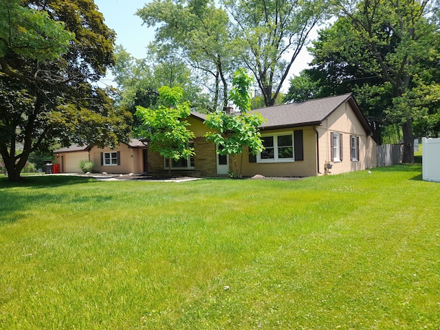5615 Carlburt St, West Bloomfield, MI 48322 - ranch-style house with an attached garage and a chimney