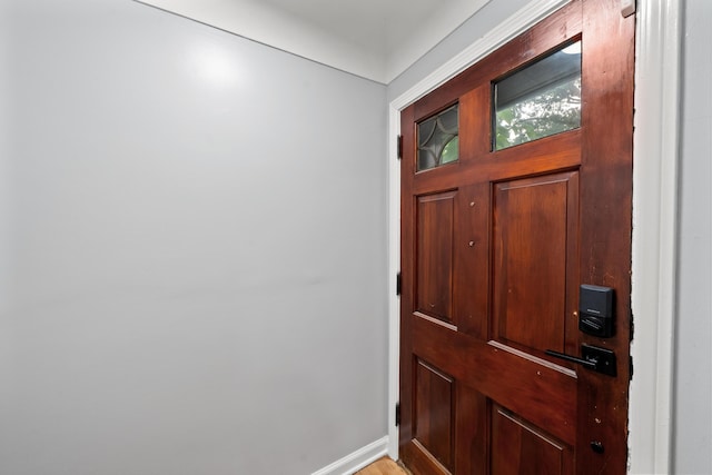 5615 Carlburt St, West Bloomfield, MI 48322 - foyer with baseboards and light wood-style floors