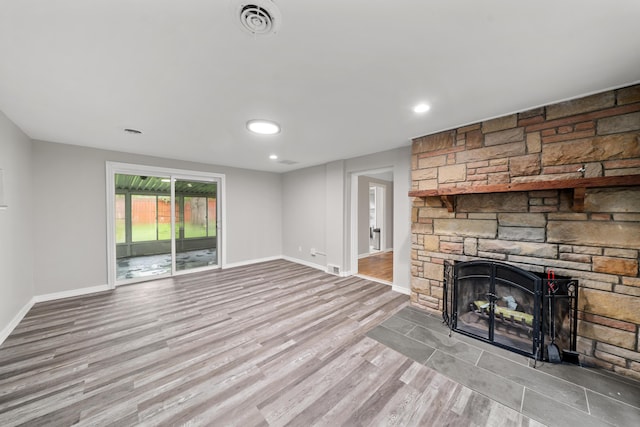 5615 Carlburt St, West Bloomfield, MI 48322 - unfurnished living room with wood finished floors, a fireplace, and recessed lighting