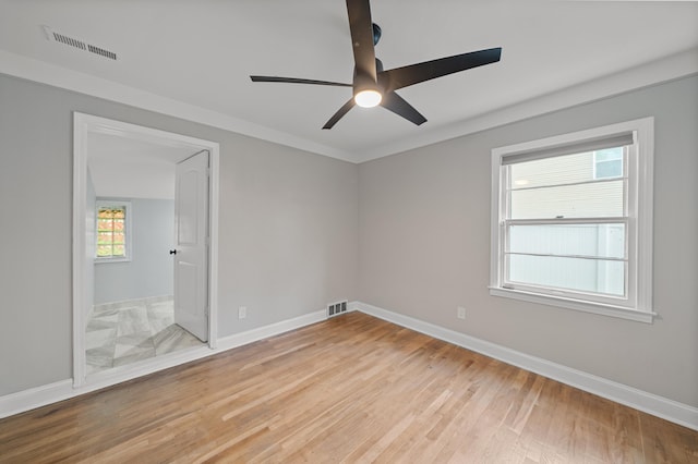 5615 Carlburt St, West Bloomfield, MI 48322 - unfurnished room featuring light wood-style floors and a ceiling fan