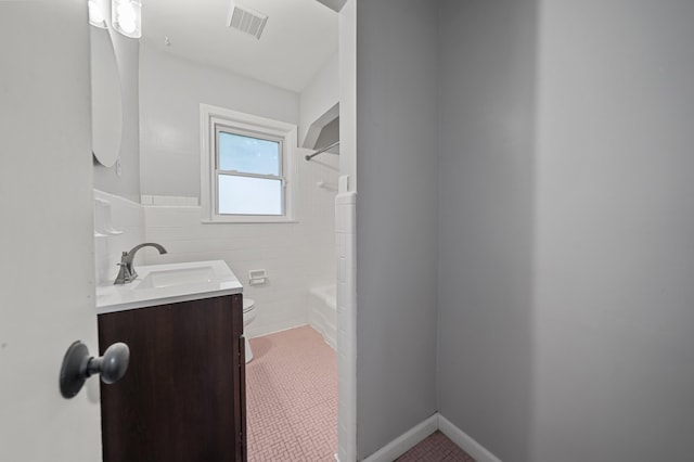 5615 Carlburt St, West Bloomfield, MI 48322 - full bath with tile walls, vanity, a wainscoted wall, and  shower combination