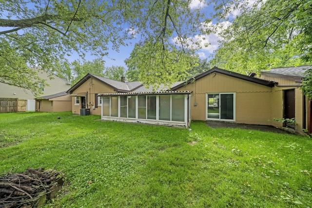 5615 Carlburt St, West Bloomfield, MI 48322 - back of house with a sunroom