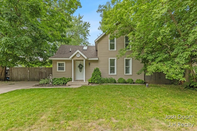 45 1st St S, Kent City, MI 49330 - traditional-style home featuring roof with shingles