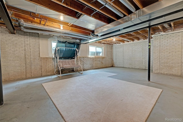 333 Sherman Ct, Ortonville, MI 48462 - basement featuring brick wall