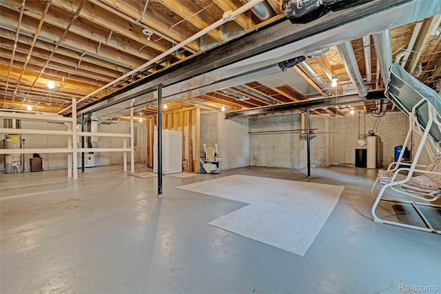 333 Sherman Ct, Ortonville, MI 48462 - unfinished basement with water heater and a water softener system