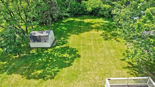 333 Sherman Ct, Ortonville, MI 48462 - view of green lawn featuring a shed