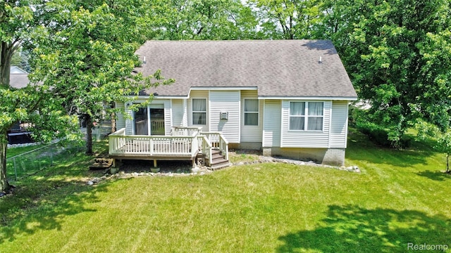 333 Sherman Ct, Ortonville, MI 48462 - view of front facade with a deck and a shingled roof