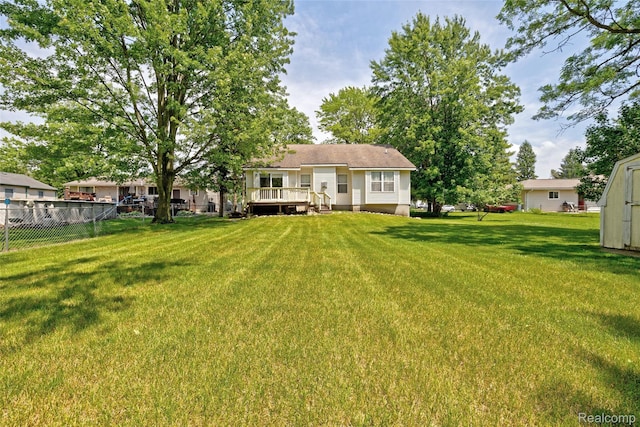 333 Sherman Ct, Ortonville, MI 48462 - back of house featuring a shed and a wooden deck