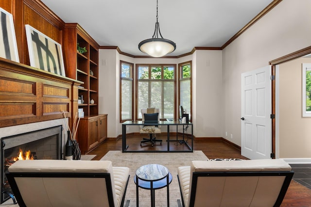 1303 Towsley Ln, Ann Arbor, MI 48105 - home office with a premium fireplace, ornamental molding, and dark wood-style flooring