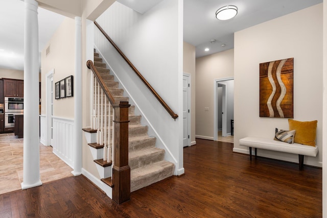 1303 Towsley Ln, Ann Arbor, MI 48105 - stairs featuring wood finished floors and baseboards
