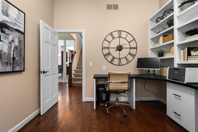 1303 Towsley Ln, Ann Arbor, MI 48105 - office area with dark wood-style flooring and baseboards