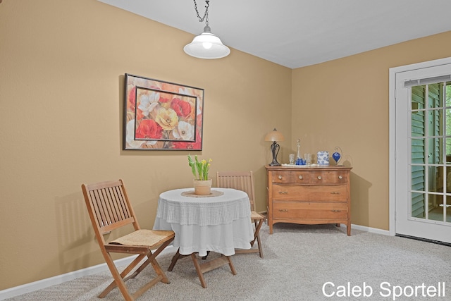 3360 Pine Meadow Dr SE Unit 202, Kentwood, MI 49512 - carpeted dining area featuring baseboards and radiator heating unit