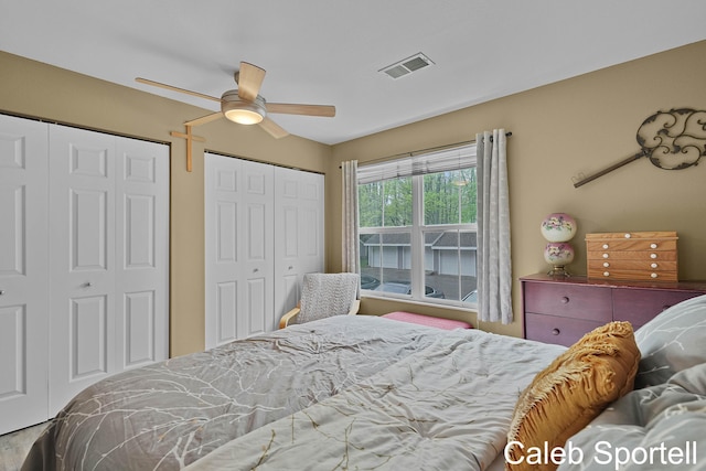 3360 Pine Meadow Dr SE Unit 202, Kentwood, MI 49512 - bedroom with multiple closets and ceiling fan