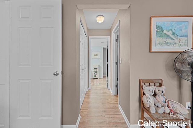 3360 Pine Meadow Dr SE Unit 202, Kentwood, MI 49512 - hallway with light wood-style floors and baseboards