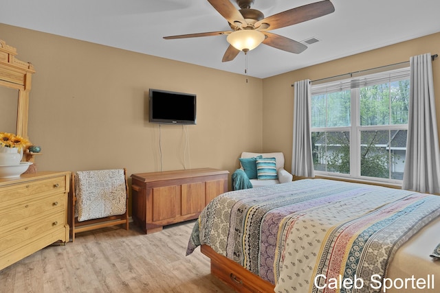 3360 Pine Meadow Dr SE Unit 202, Kentwood, MI 49512 - bedroom featuring light wood-type flooring and ceiling fan