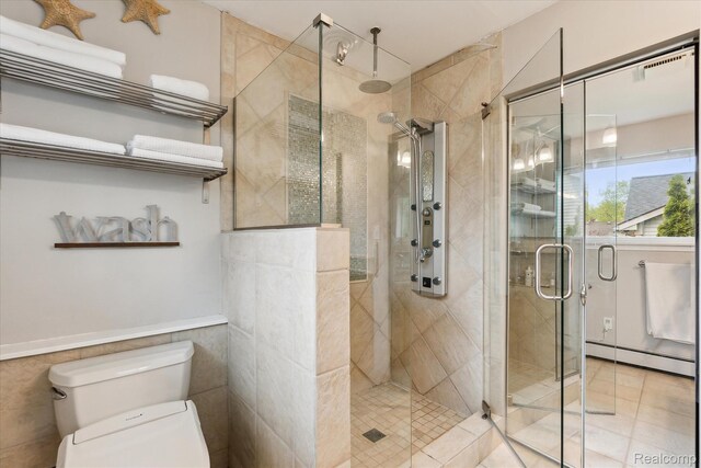 9669 Norman Rd, Clarkston, MI 48348 - bathroom with a stall shower and tile walls