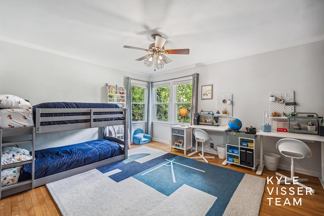 1624 Boston St SE, Grand Rapids, MI 49506 - bedroom featuring crown molding, wood finished floors, and a ceiling fan