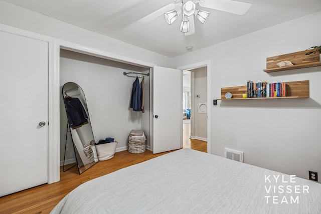 1624 Boston St SE, Grand Rapids, MI 49506 - bedroom with wood finished floors, a closet, and ceiling fan